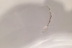 Impact damage side of bath